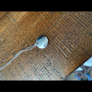 Authentic Tiffany and Co. Initial J pendant In sterling silver.